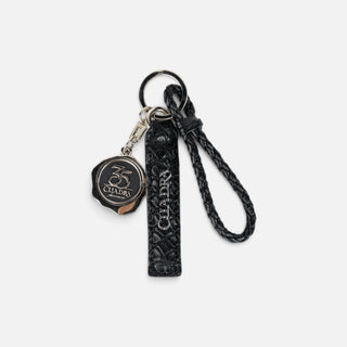 Llavero Cuadra Cocodrilo 35 Aniversario Negro